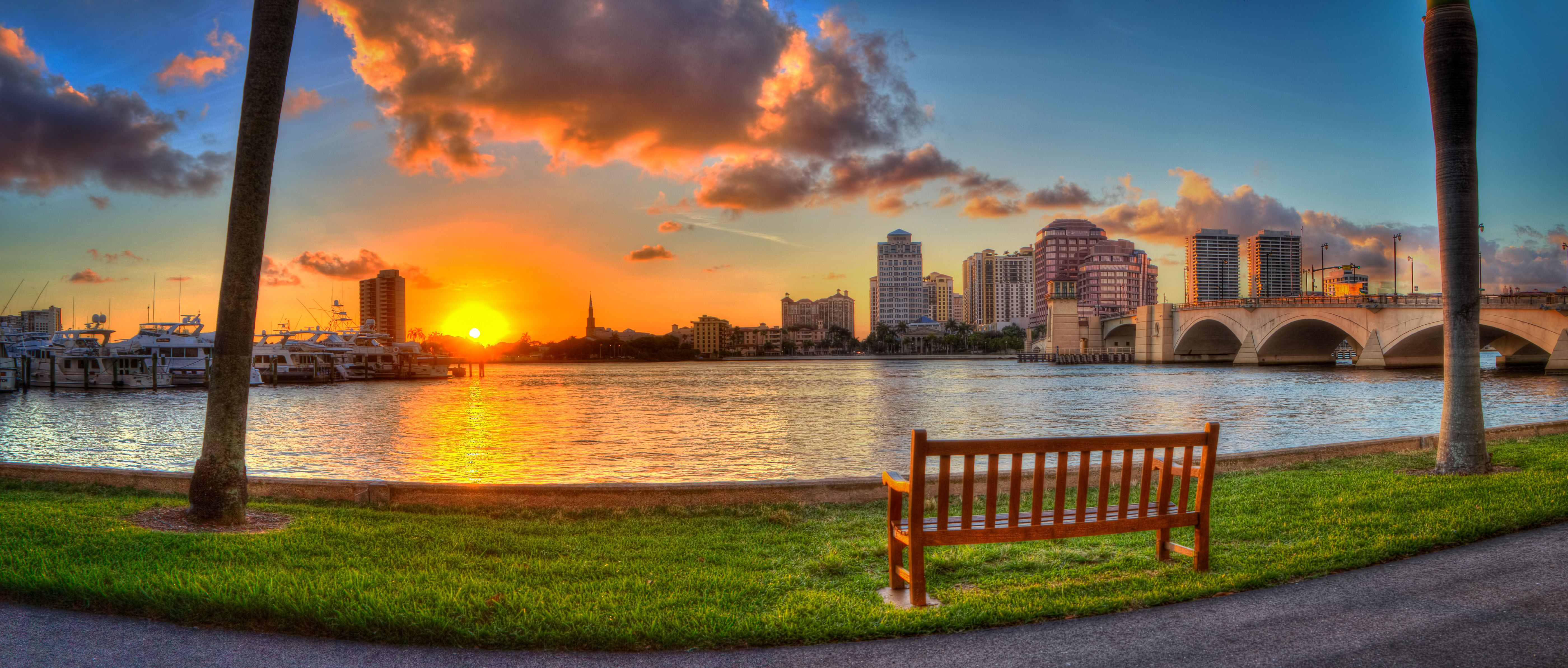Sunset view of the West Palm Beach skyline and waterfront bridge
